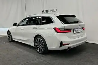 BMW 320, 2.0, 140 kW, гибрид д+э, автомат, полный привод