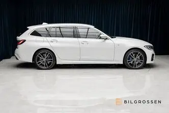 BMW 330, 2.0, 215 kW, гибрид, автомат, полный привод