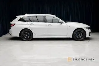 BMW 330, 2.0, 215 kW, гибрид, автомат, полный привод